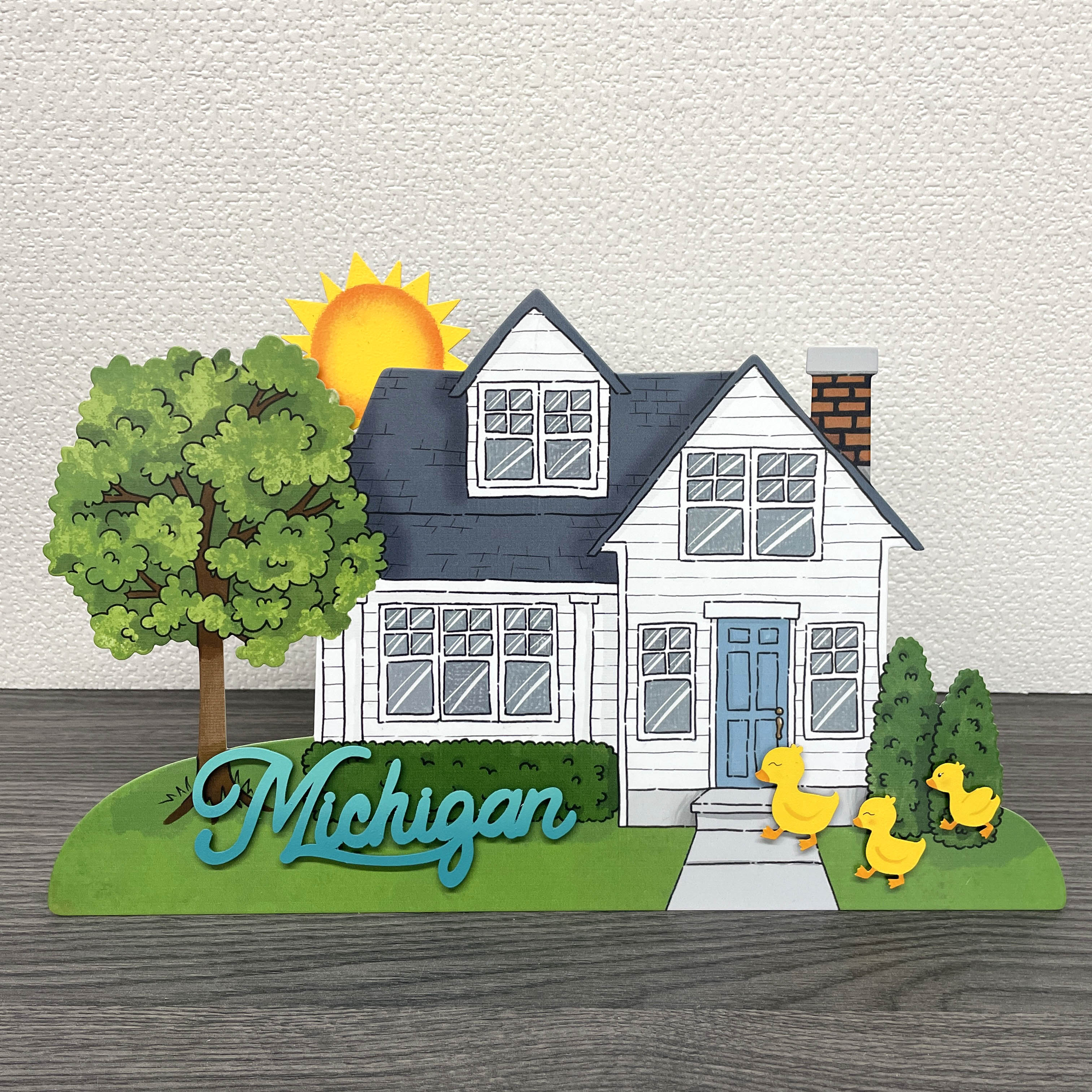 Blauer Magnet mit „Michigan“-Schriftzug