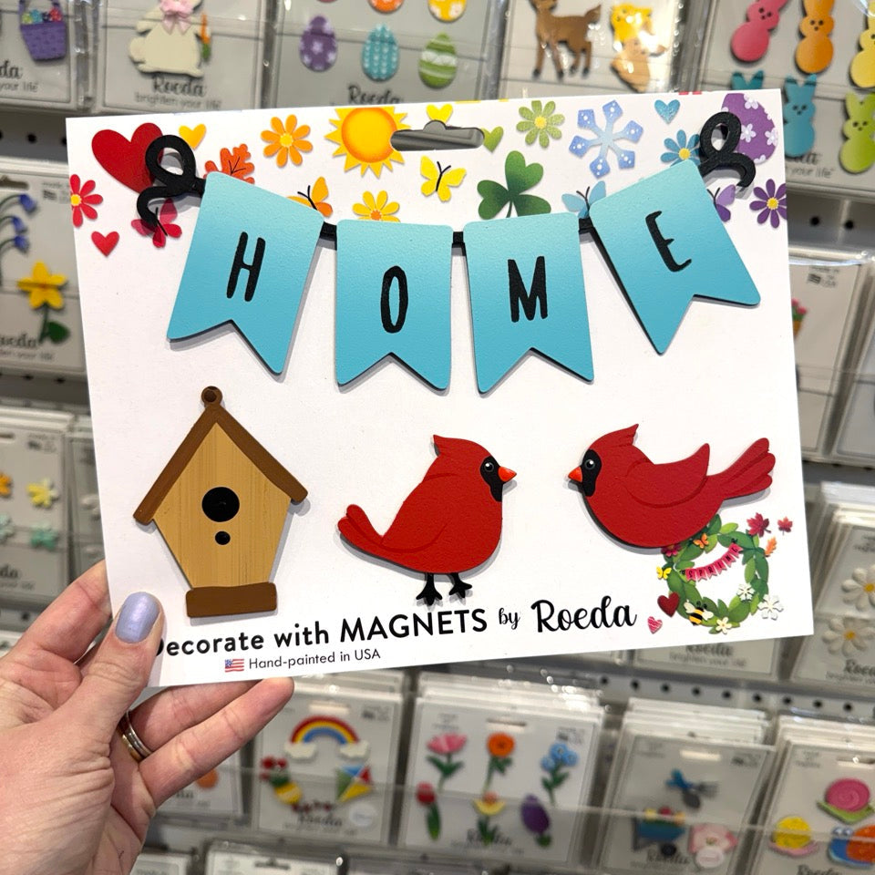 Hand holding a magnet set with &