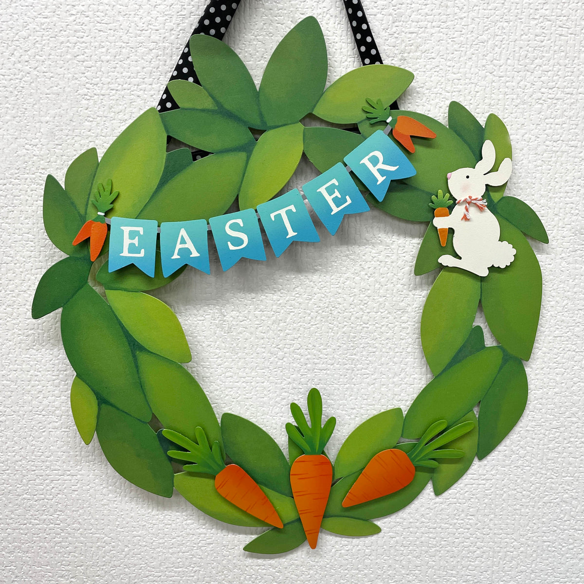 Hase mit Karottenmagnet