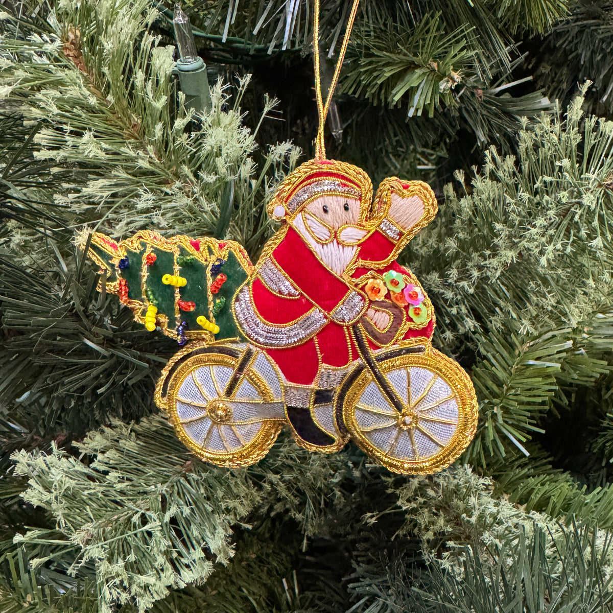 Santa on Bike Ornament - Hand Embroidered